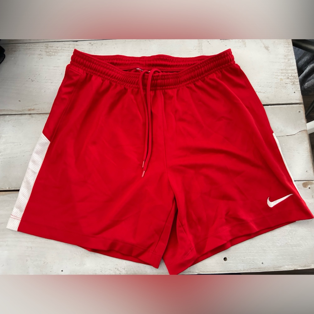 Boys Nike dri-fit shorts size Small.  Color is red.
